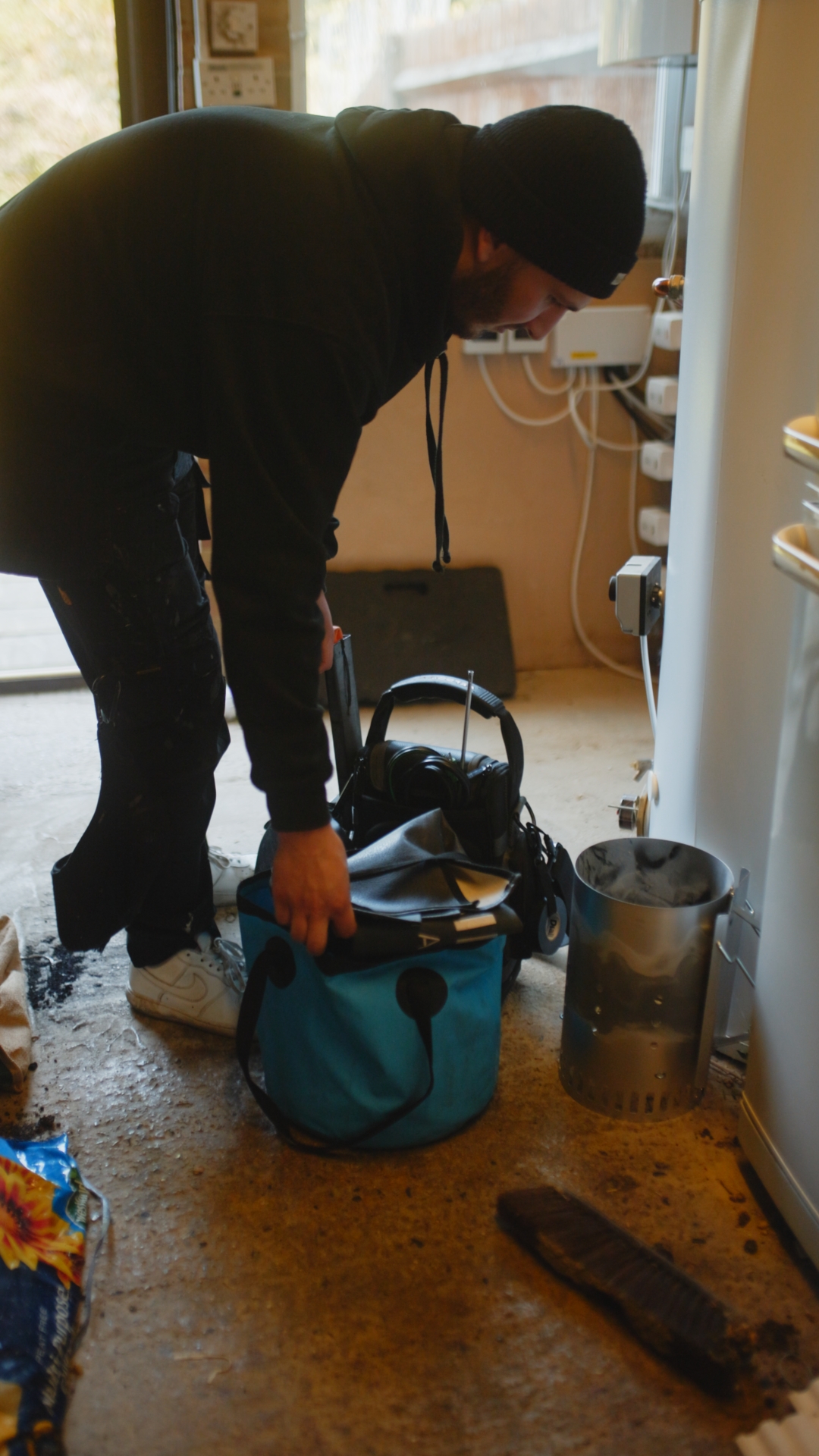 Plumbing on demand gas and electrical specialists sorting through some equipment